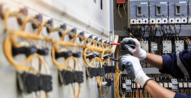 Professional Electrician technician working in Teaticket, MA